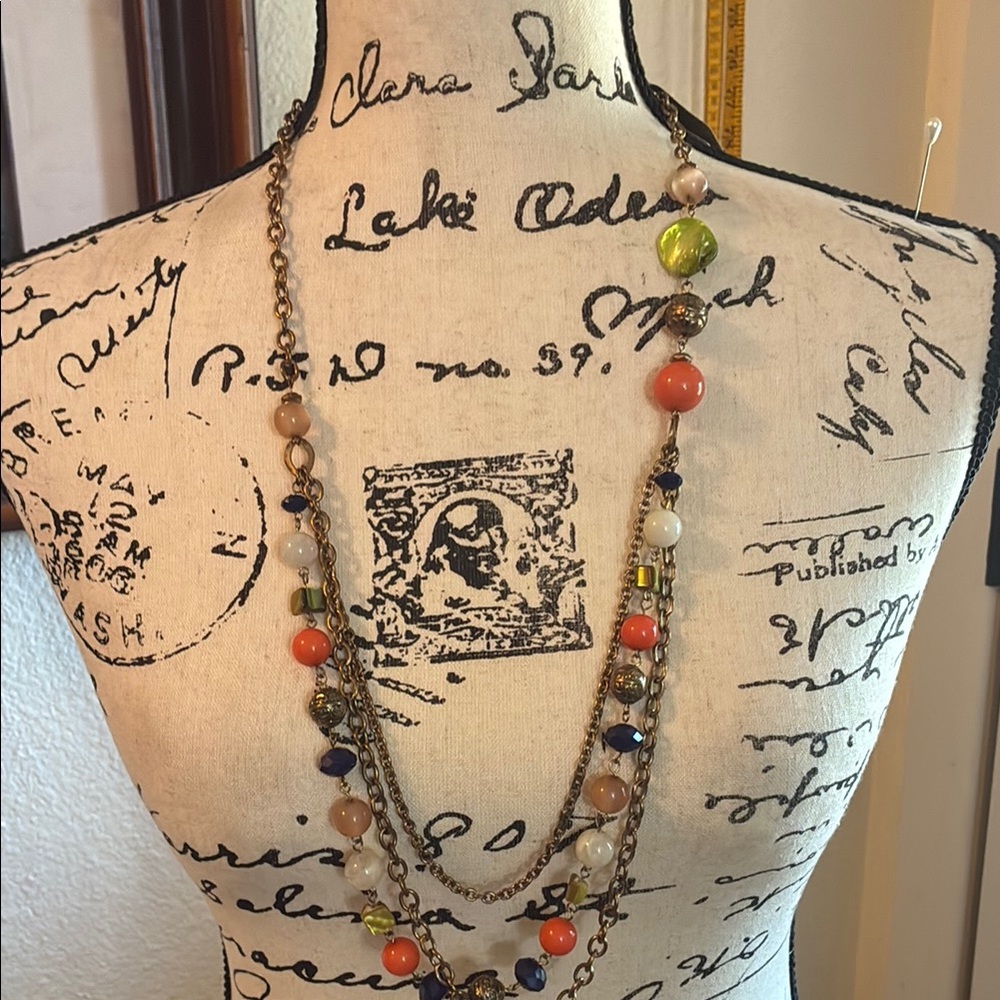 Necklace ruby road w/orange, green, gold & white bead